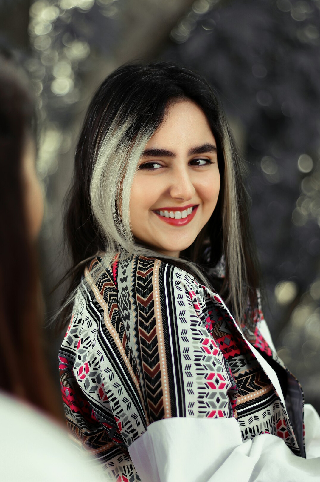 Portrait of a smiling woman with long hair