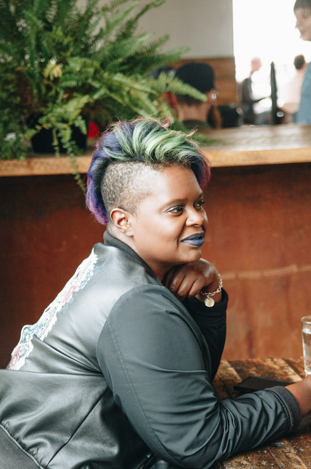 Portrait of a woman with short hair smiling